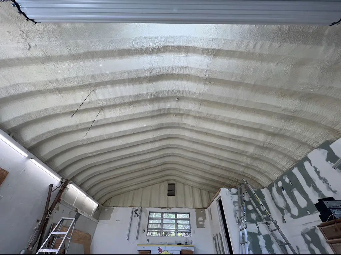 Spray polyurethane foam applied to the underside of a metal roof deck in South Lebanon